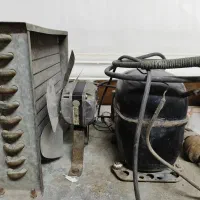 کمپرسور یک سوم دانفوس به همراه فن و کندانسور اصلی