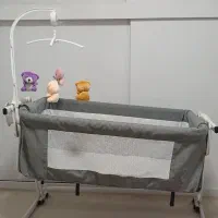 تخت و ننو کنار مادر