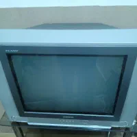 تلویزیون بیست ویک اینج سامسونگ با میز شیشه ای