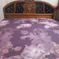 تخت خواب چوبی دو نفره منبت کاری شده