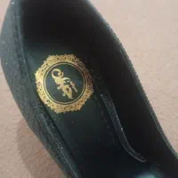 کفش|کیف، کفش، کمربند|قم, حکمت شمالی|دیوار