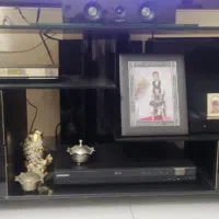 میز تلویزیون شیشه ای ترک شیک بدون خش .ضرب