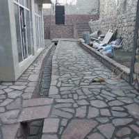 تهیه و اجرای سنگ کوهی و لاشه کف و دیوارو پله وغیره