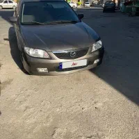 مزدا ۳۲۳ اتومات تیپ پنج سانروف دار مدل ۸۳