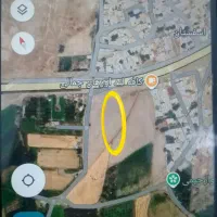 زمین کنار جاده اصلی