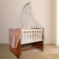 تخت گهواره کنار مادر