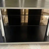 میز تلویزیون در حد نو جنس ام دی آف و استیل