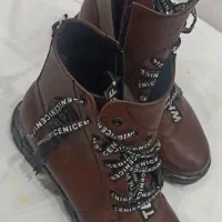 پوتین ، کیف ، کوله