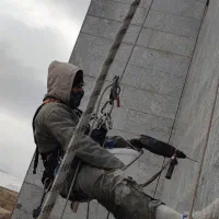 کار در ارتفاع خدمات ساختمانی عایق نانو پیچرولپلاک