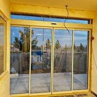 درب شیشه ای فریم دار تضمینی