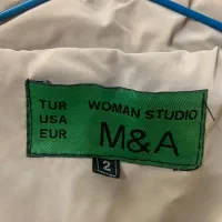 کاپشن|لباس|تربتحیدریه, حسنی بالا|دیوار