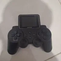 آتاری دستی با ۵۱۲ بازی نو متصل به تلویزیون فروشی