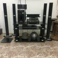 میز تلویزیون مشکی شیشهای به همراه سینما خانواده