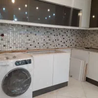 اجرای بین کابینت با سرامیک و دکور آجر های سنتی