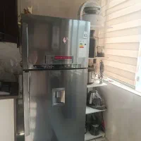 یخچال و ماشین لباسشویی و تلویزیون