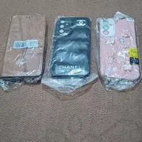 گاردگوشی a34کیف کتابی وعروسکی نونو.