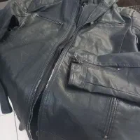 کاپشن چرم وارداتی  اکبند دوکاره  با کلاه فقط۳تومن