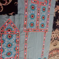 لباس بچگانه نیمه دوز