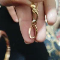 یک جفت گوشواره یک انگشتر