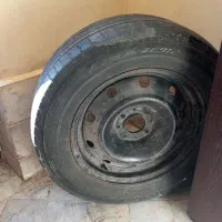 یک عدد لاستیک به همراه رینگ 15