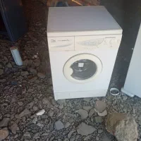 فرش . لباس شوی. گاز پنج شعله