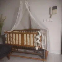تخت گهواره ای نوزاد