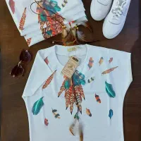 لباس طرح برگ با آویز پر