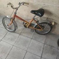 دوچرخه بچه گانه زرد قناری