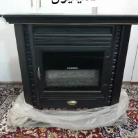 بخاری و چرخ خیاطی