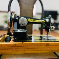 چرخ خیاطی|چرخ خیاطی و ریسندگی|ثلاث باباجانی, |دیوار