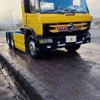 کشنده تی 300 با کانتینر چادری دو محور