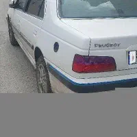 پژو پارس سفید لا کاغذی  خیلی تمیز وکم کار کارمندی