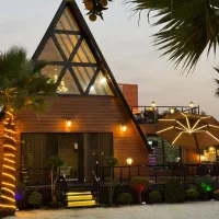 اجاره کلبه سویسی جکوزی باغ ی چمستان