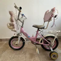 دوچرخه دخترانه با کمکی|دوچرخه، اسکیت، اسکوتر|مشهد, امامیه (شهرک غرب)|دیوار