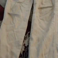 شلوار لی رنگ کرم بچه گانه