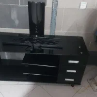 زیر تلویزیون شیشه ای