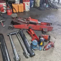 تعمیرات تخصصی انواع جک های سوسماری وروغنی