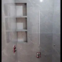 استاد کار کاشی کاری با ۲۰سال سابقه