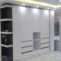 ساخت نصب تعمیرات ونصاب کابینت کمد دیواری دکورمغازه