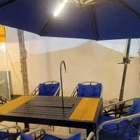 سایبان نشان  چتر آتشدان میزصندلی