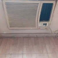 کولر پنجره ای ال جی به همراه پایه آهنی