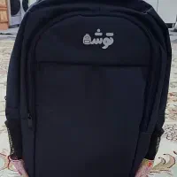 کیف مدرسه، قمقمه ی سیلیکونی و تعدادی لوازم تحریر