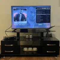 تلویزیون LG / میز تلویزیونی شیشه ای