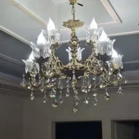 میز  تلویزیون  ودو عدد لوستر برنجی