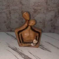 مجسمه آغوش طرح چوب