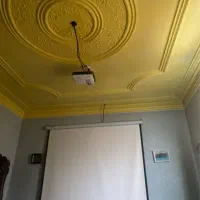 ویدو پورژکتور با پرده سینما