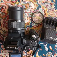 دوربین عکاسی و فیلم برداری نیمه حرفه ای