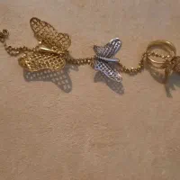 دستبند پروانه ۵ در صد بالای تابلو