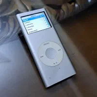 پخش کننده موزیک همراه اپل . mp4 . ipod