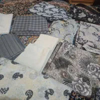 مقداری پارچه چادری وپیراهن مردانه بفروش میرسد